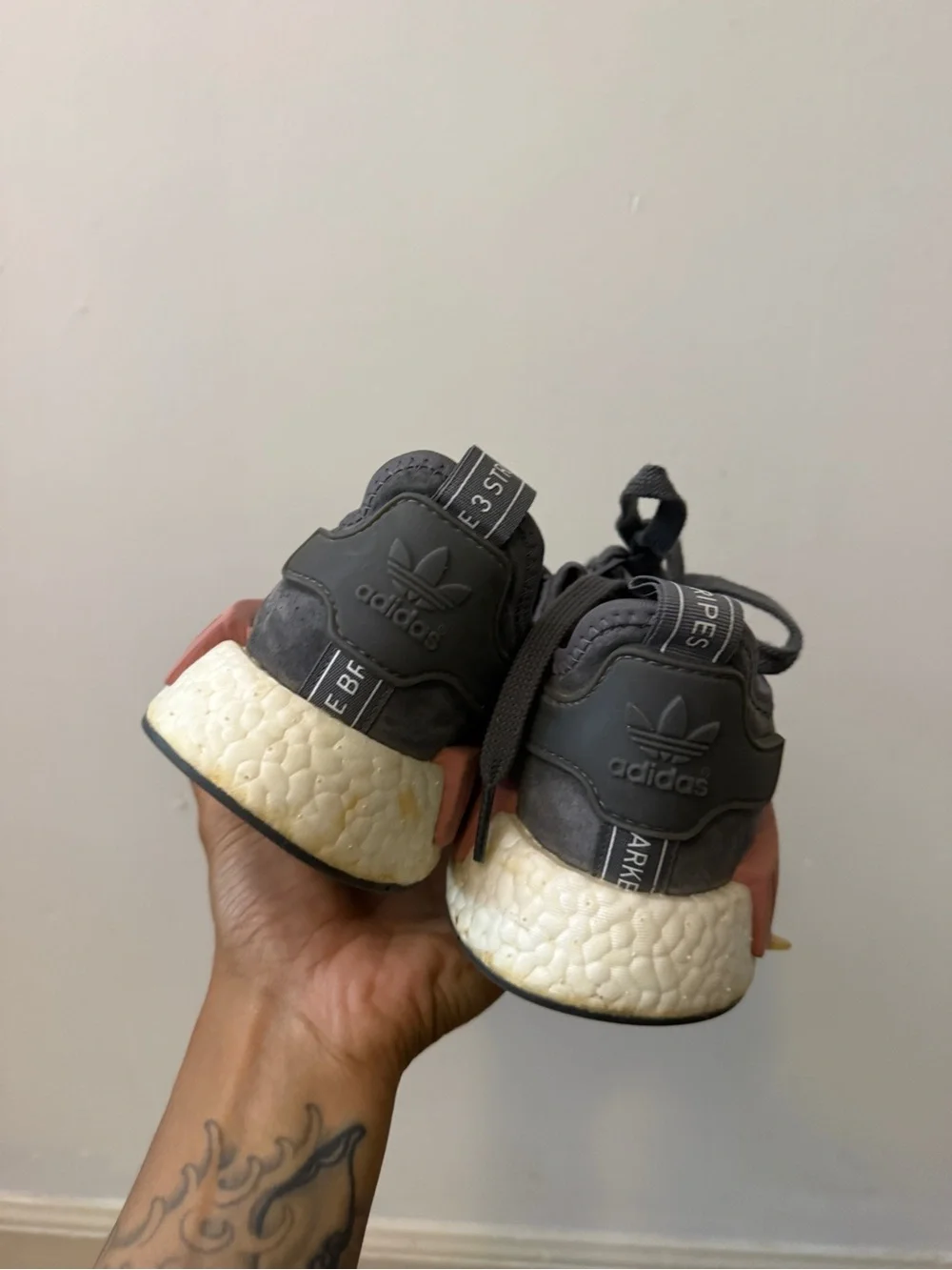 adidas Women’s Black/Grey Knit NMD_R1 Sneakers with Rose Accent